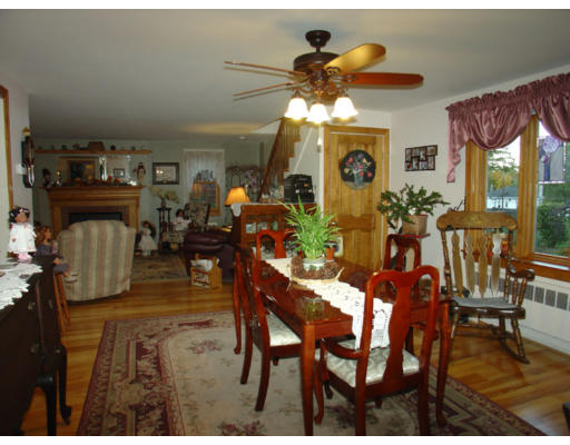 129 Walnut Hill Road Orange, MA 01364 - Photo 5 of 23 a view of a dining room with furniture