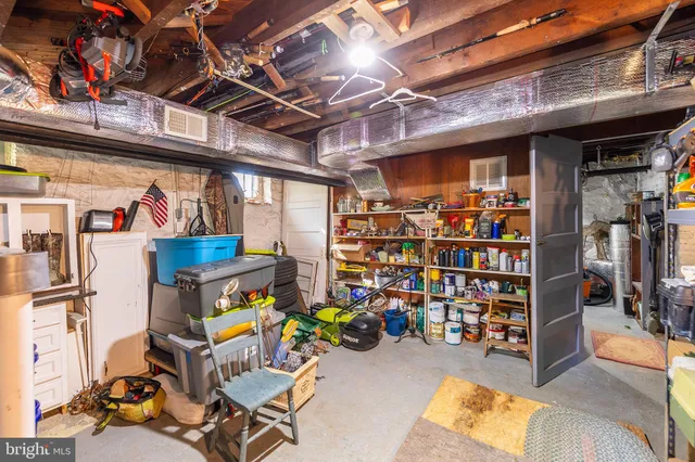 a room with lots of books and vegetables