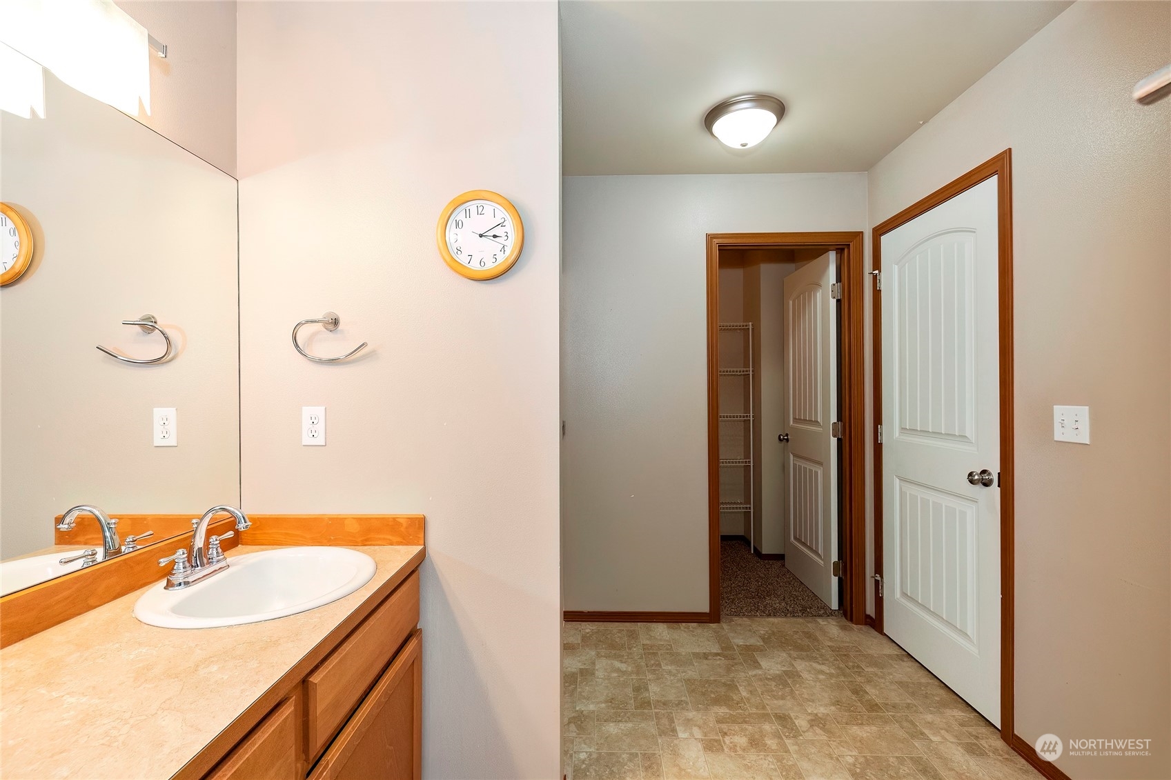 166 Gazebo Street Port Orchard, WA 98366 - Photo 17 of 22 a bathroom with a sink and a mirror