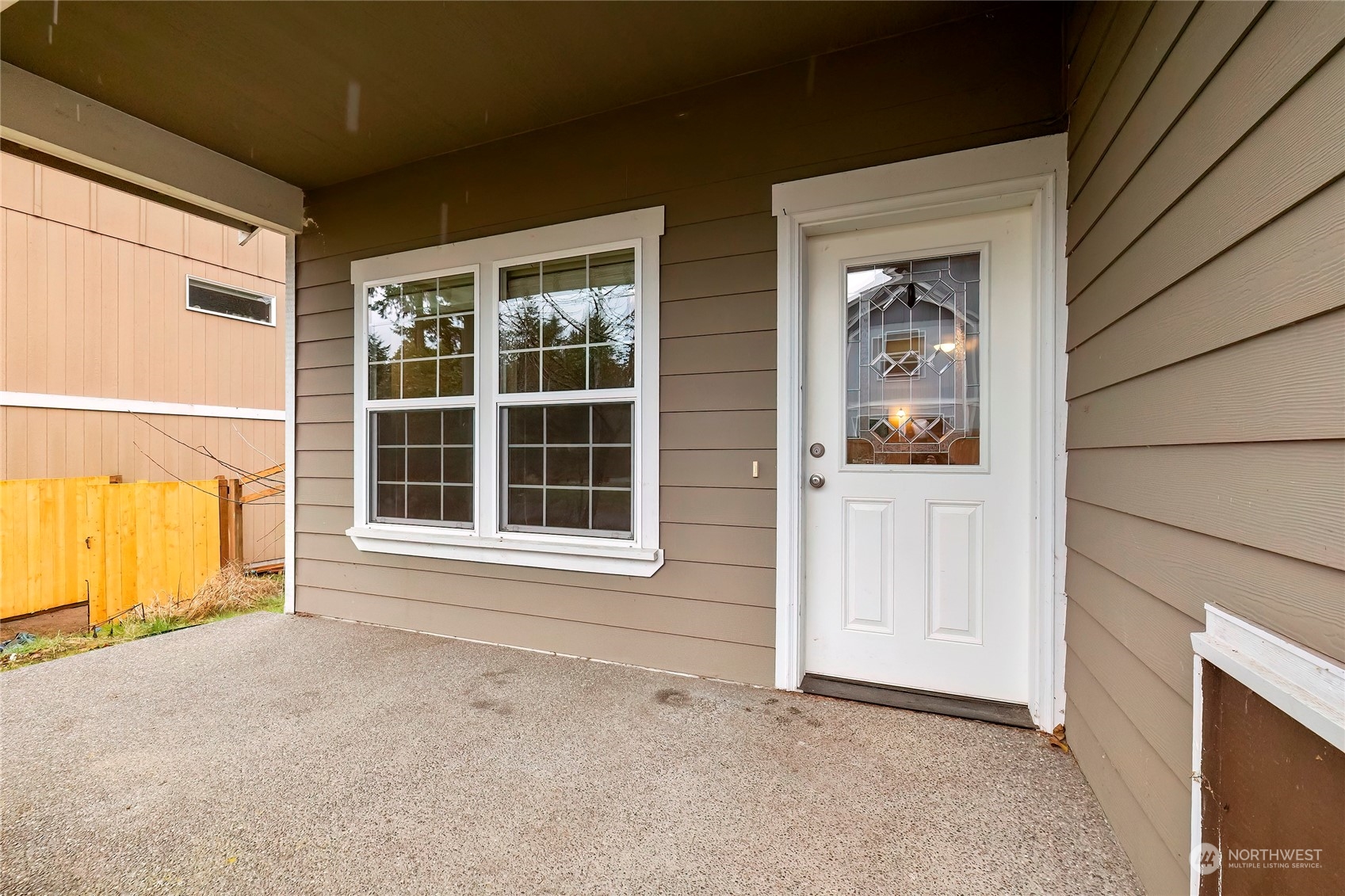 166 Gazebo Street Port Orchard, WA 98366 - Photo 2 of 22 a view of an empty room with a window