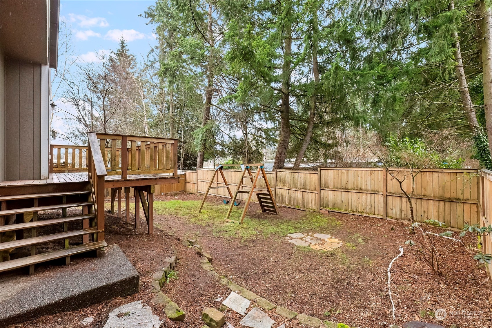 166 Gazebo Street Port Orchard, WA 98366 - Photo 22 of 22 a view of a backyard with a bench