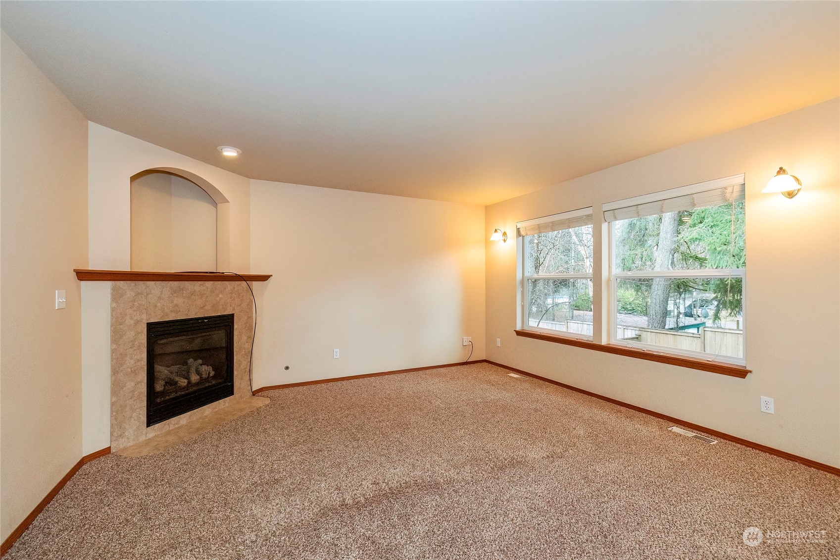 166 Gazebo Street Port Orchard, WA 98366 - Photo 5 of 22 a view of empty room with window and fireplace