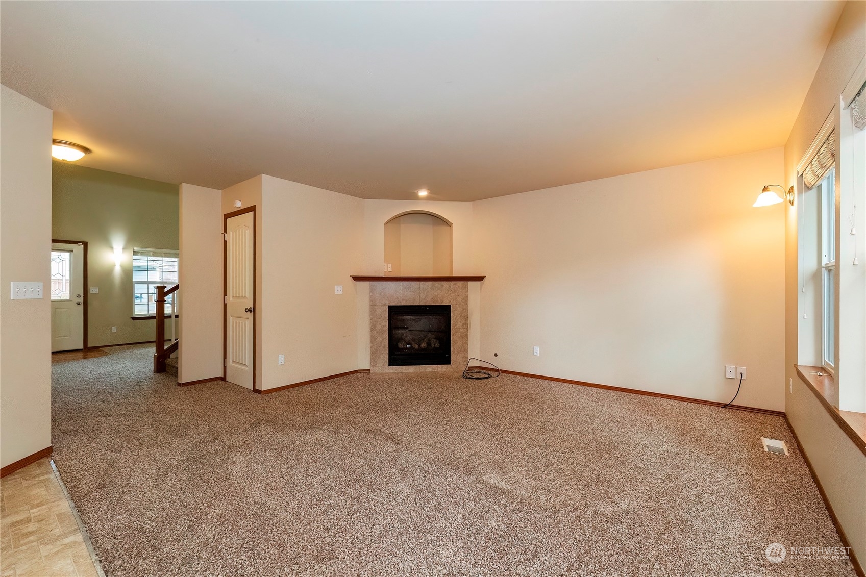 166 Gazebo Street Port Orchard, WA 98366 - Photo 8 of 22 a view of an empty room with a fireplace