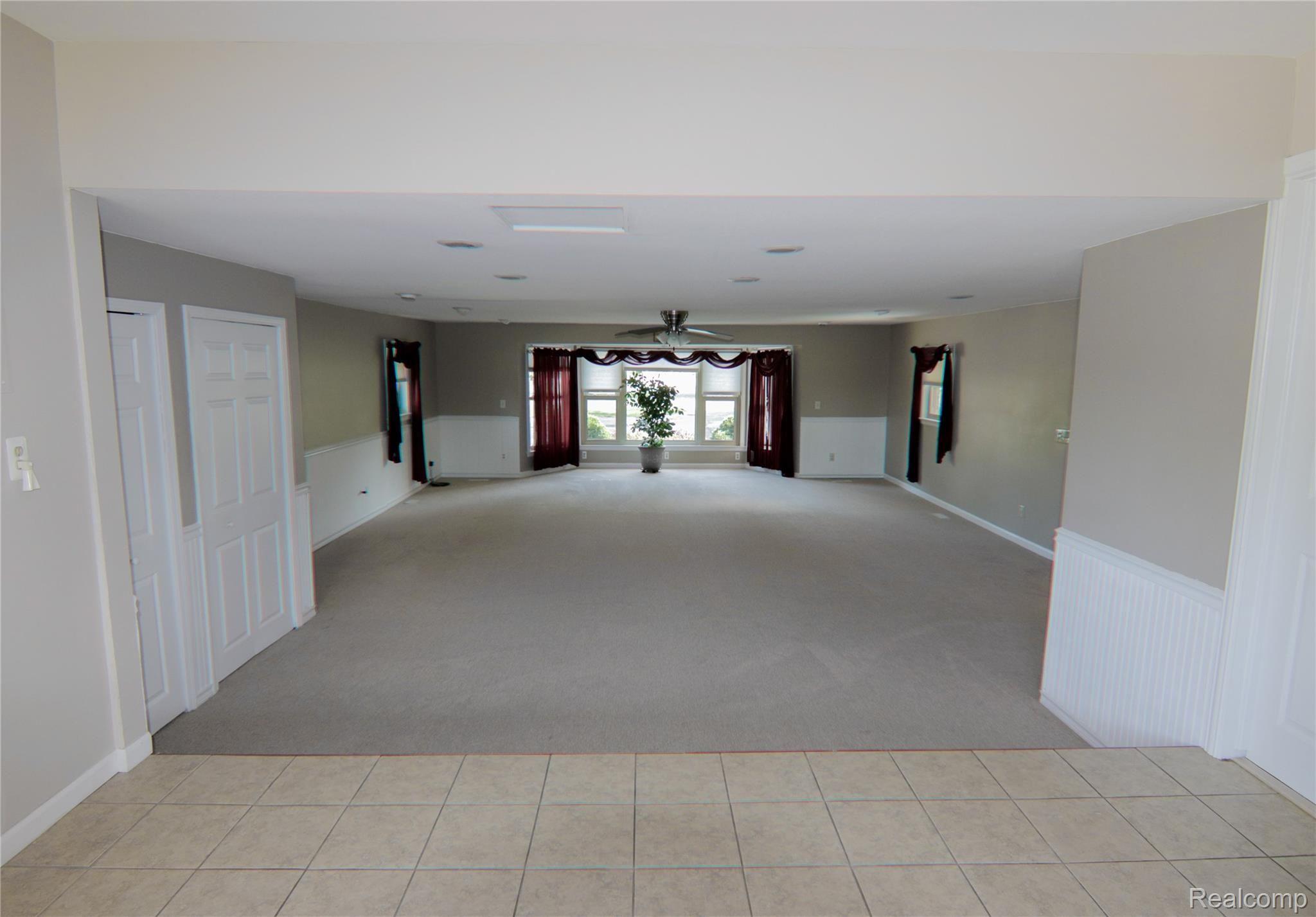 11156 Fenton Road Fenton, MI 48430 - Photo 5 of 22 11156 Fenton Rd - Living Room.jpg