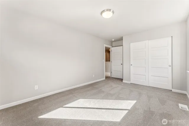 an empty room with closet