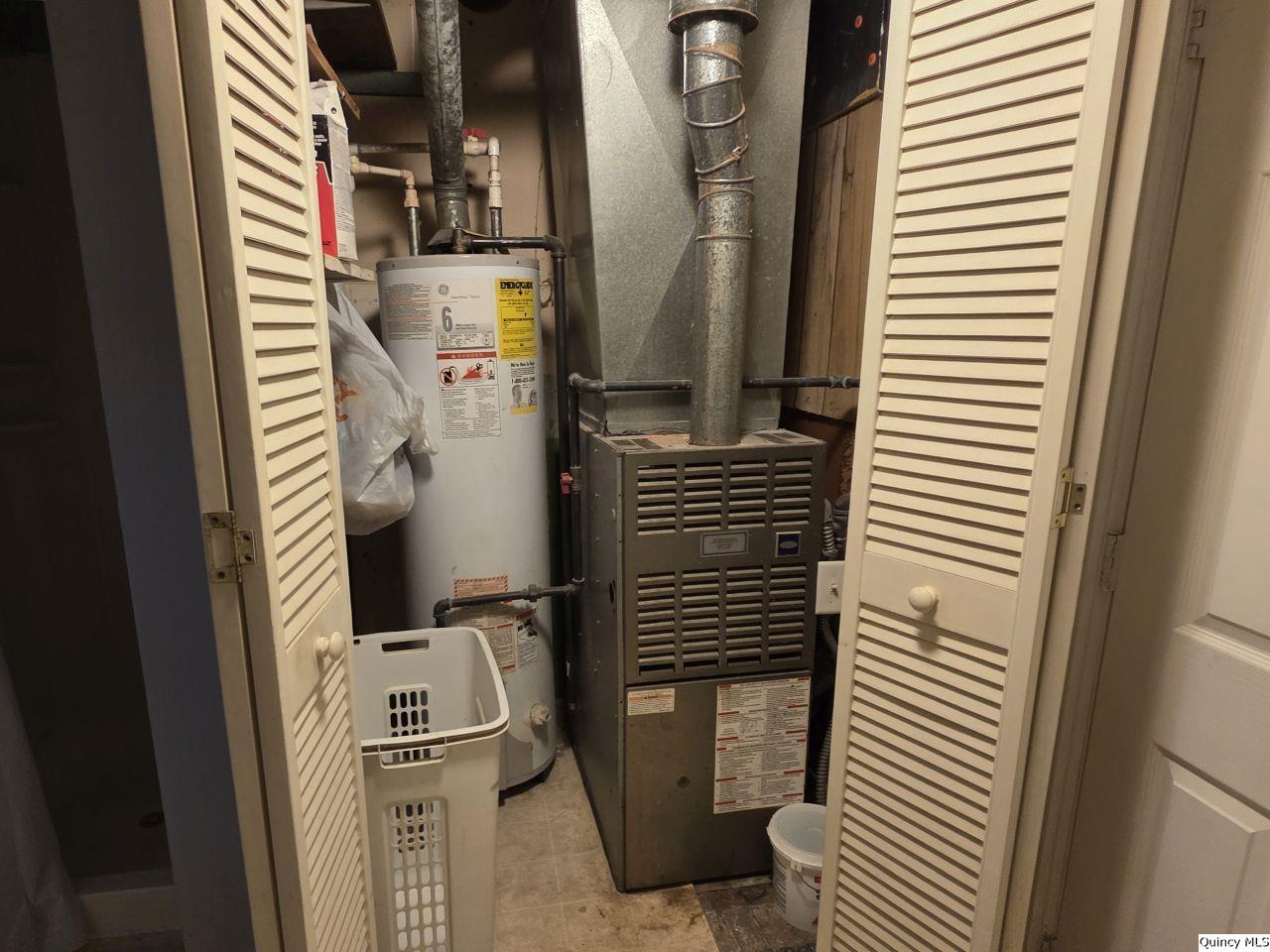 1717 North 4th Street Quincy, IL 62301 - Photo 6 of 8 a close view of water heater room