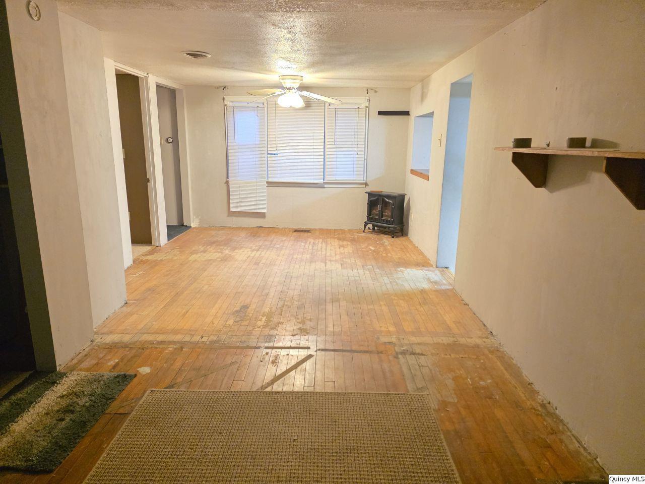 1717 North 4th Street Quincy, IL 62301 - Photo 8 of 8 a large white room with a large mirror