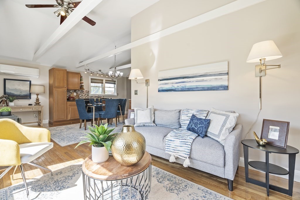 645 Nashua Road Dracut, MA 01826 - Photo 13 of 30 a living room with furniture and wooden floor