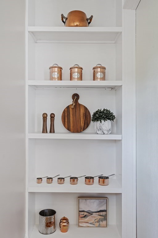 645 Nashua Road Dracut, MA 01826 - Photo 14 of 30 a shelf with cup and plates