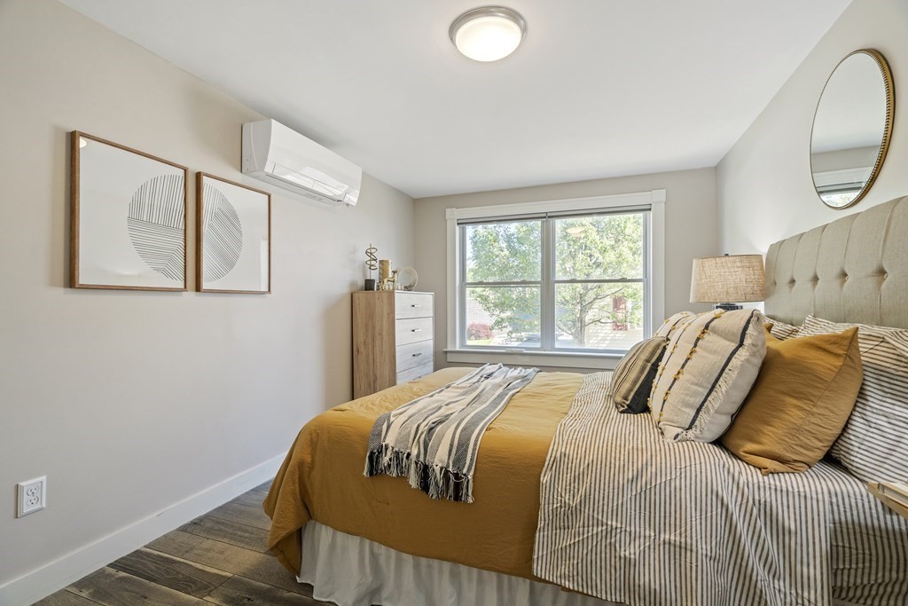 645 Nashua Road Dracut, MA 01826 - Photo 16 of 30 a bedroom with a bed and a window