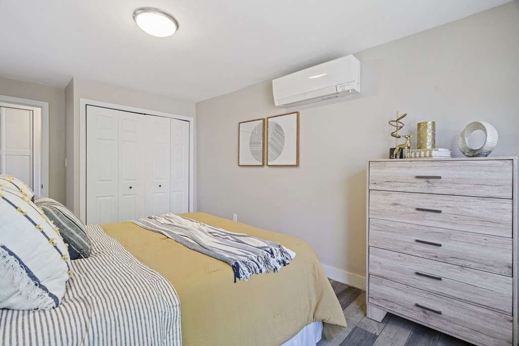 645 Nashua Road Dracut, MA 01826 - Photo 17 of 30 a bedroom with a bed and a window