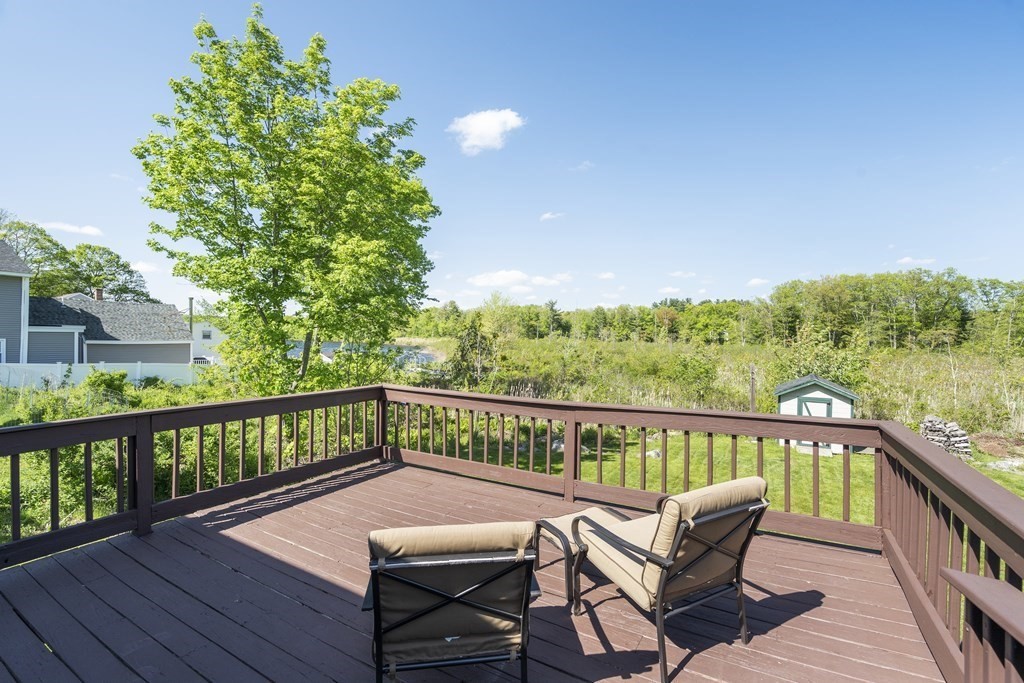 645 Nashua Road Dracut, MA 01826 - Photo 25 of 30 a view of a two chairs in the balcony