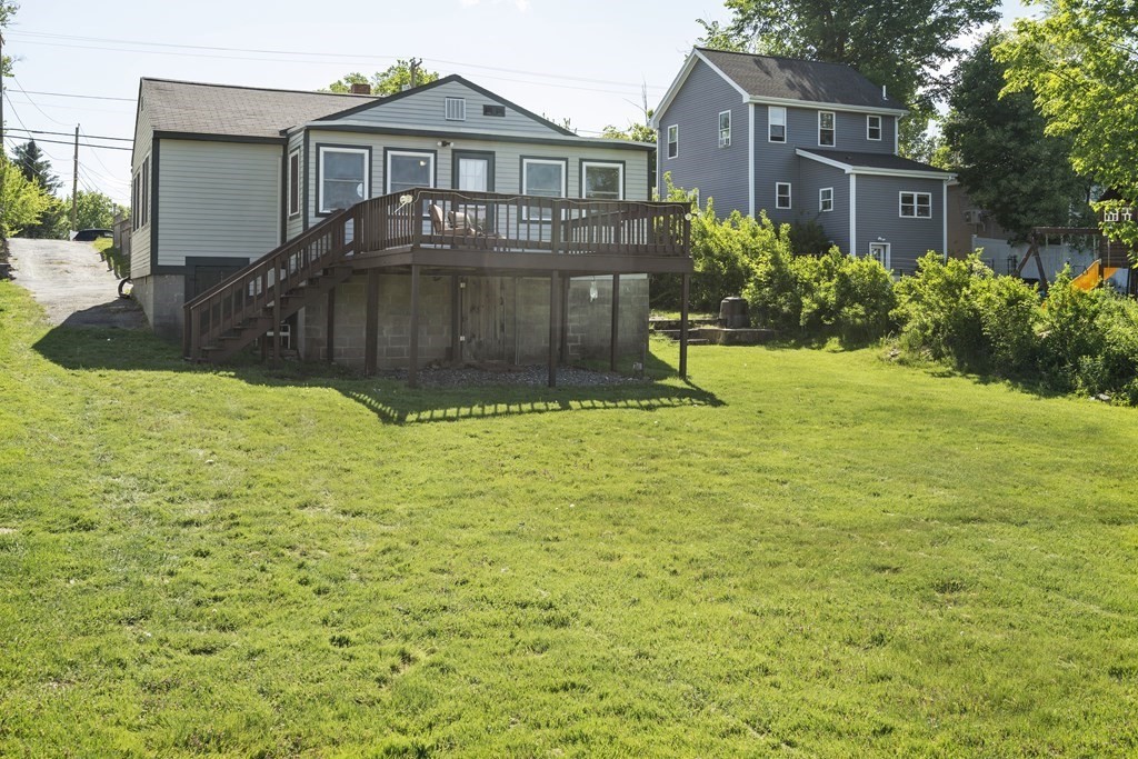 645 Nashua Road Dracut, MA 01826 - Photo 28 of 30 a front view of a house with yard and green space