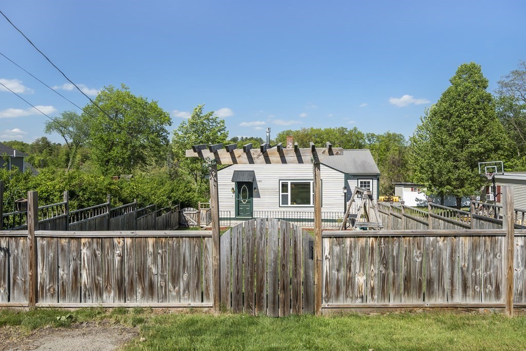 645 Nashua Road Dracut, MA 01826 - Photo 30 of 30 a front view of a house with a yard