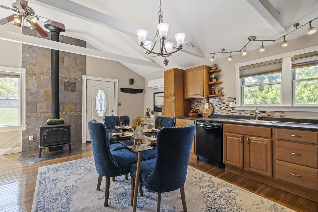 645 Nashua Road Dracut, MA 01826 - Photo 6 of 30 a view of a dining room with furniture window and wooden floor