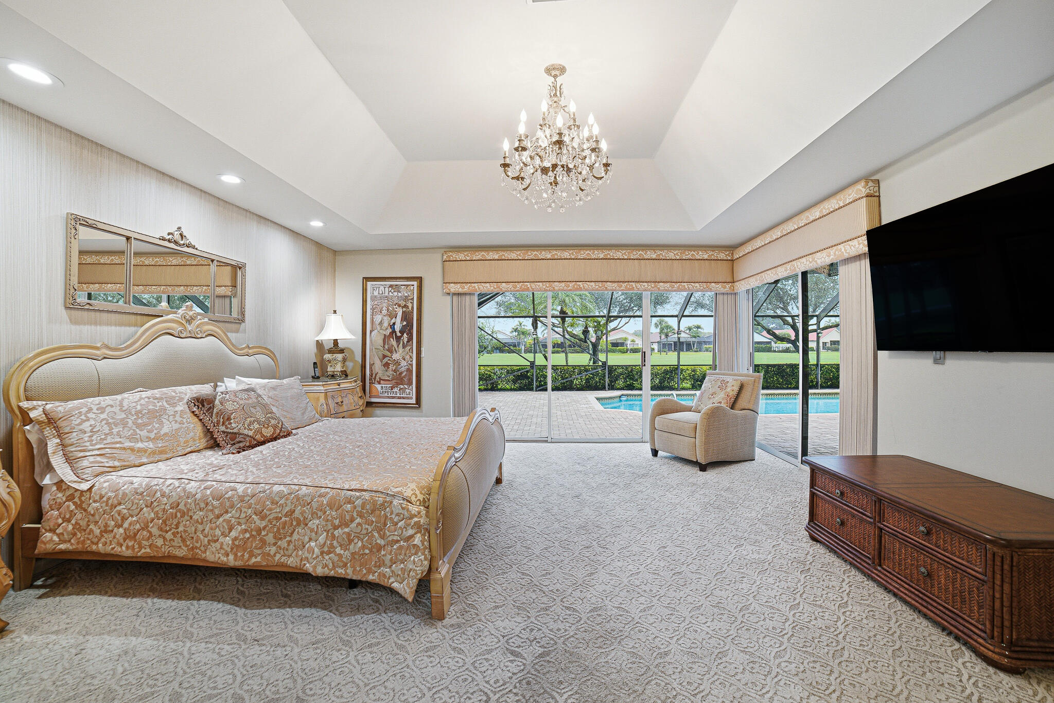 10791 River Glenn Drive Boca Raton, FL 33428 - Photo 28 of 68 a spacious bedroom with a bed and glass window