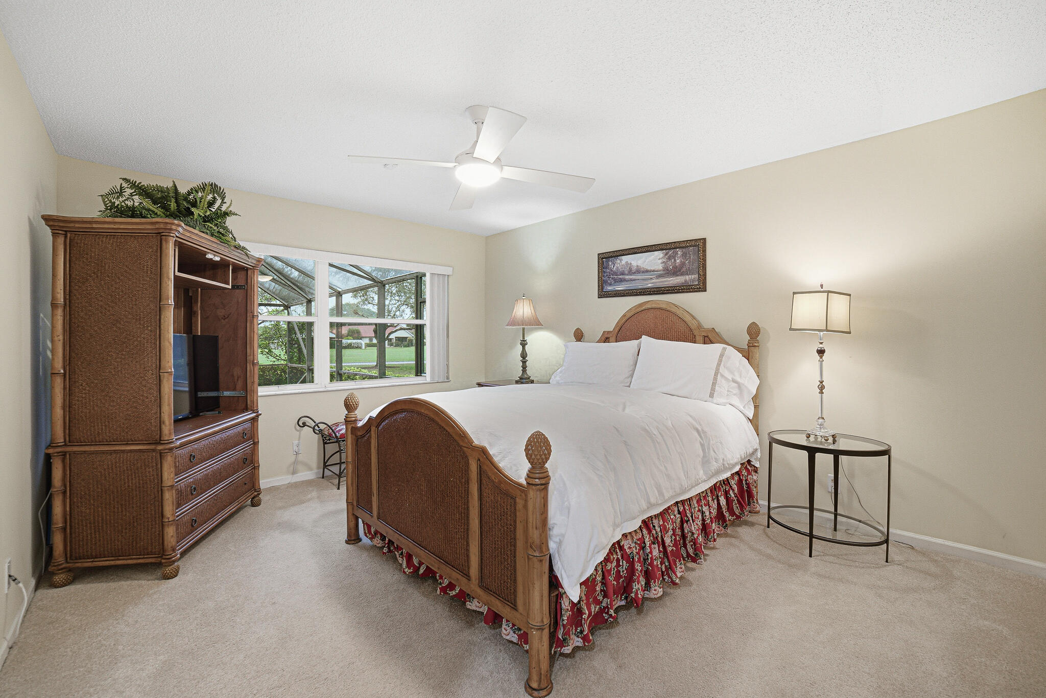 10791 River Glenn Drive Boca Raton, FL 33428 - Photo 34 of 68 a bedroom with a bed closet and a window