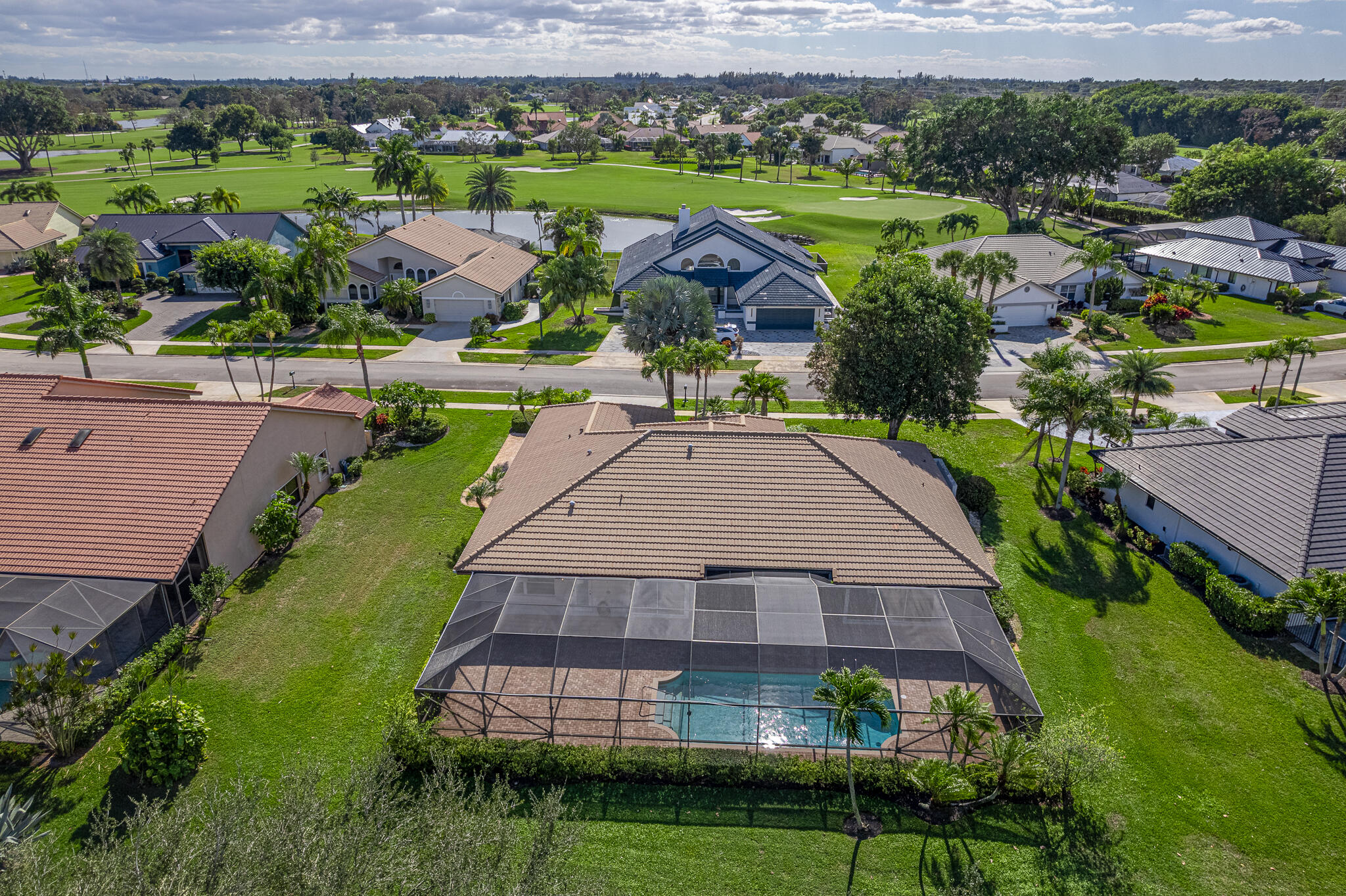 10791 River Glenn Drive Boca Raton, FL 33428 - Photo 41 of 68 an aerial view of a house with yard swimming pool and outdoor seating
