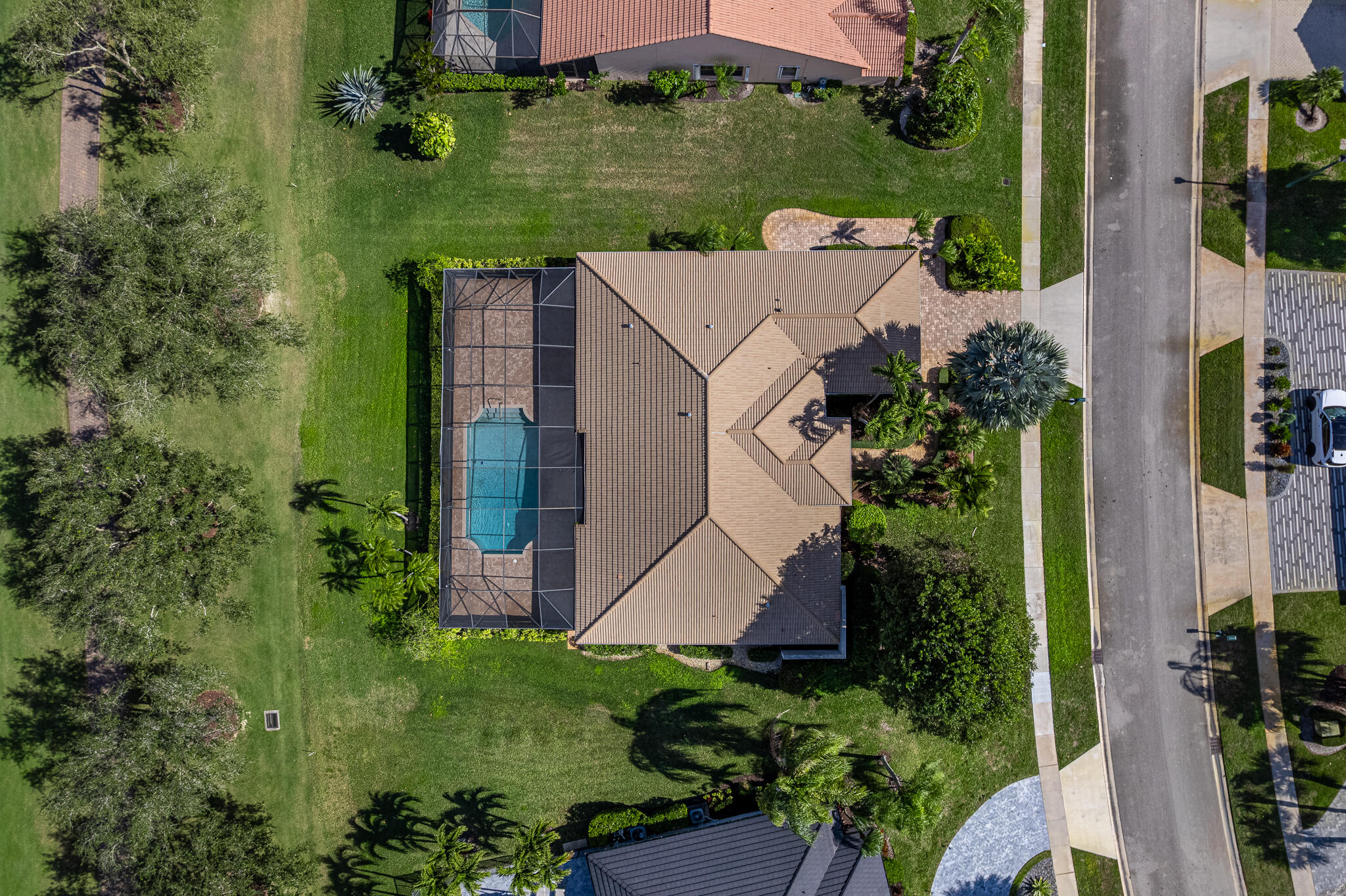 10791 River Glenn Drive Boca Raton, FL 33428 - Photo 43 of 68 an aerial view of a house with pool garden and plants