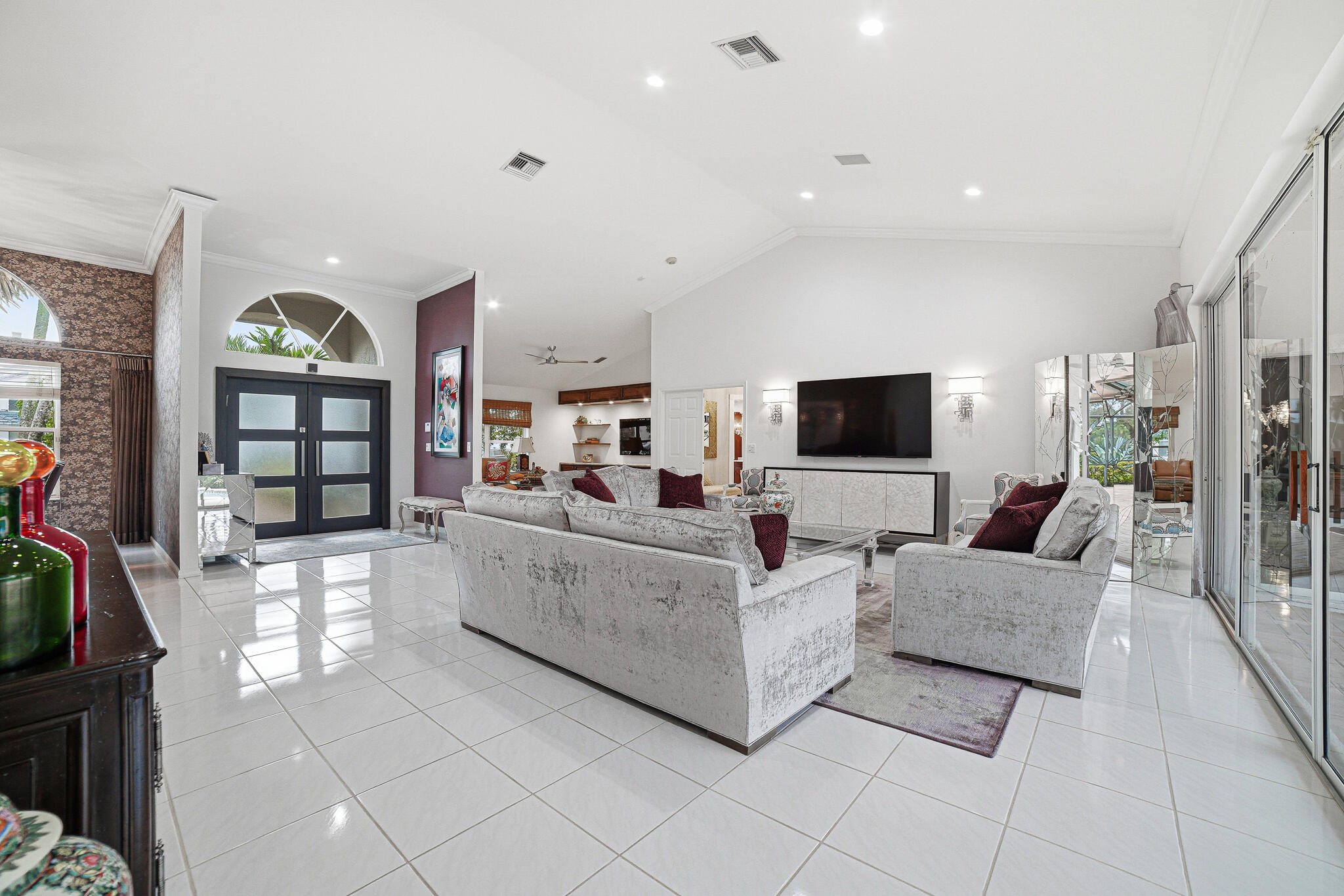 10791 River Glenn Drive Boca Raton, FL 33428 - Photo 10 of 68 a living room with furniture and a flat screen tv