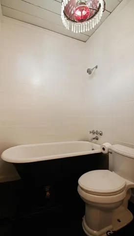 a bathroom with a toilet