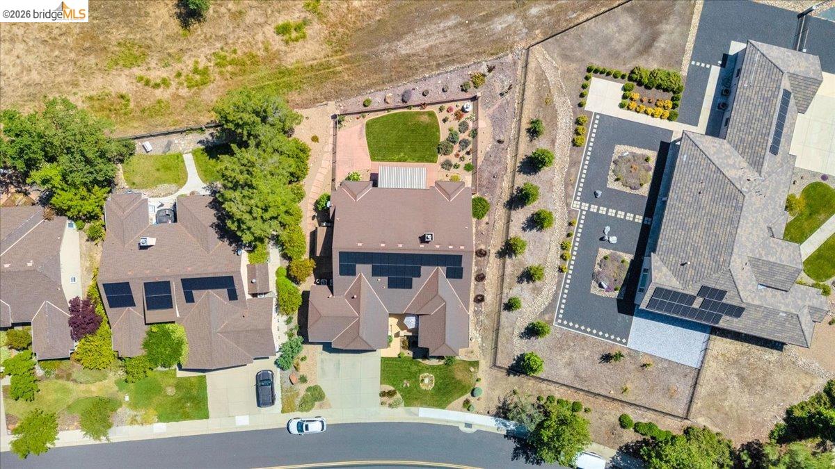 158 Rock Ridge Lane Copperopolis, CA 95228 - Photo 67 of 72 Aerial view highlighting a residential property with a multi-gabled roof and a spacious backyard