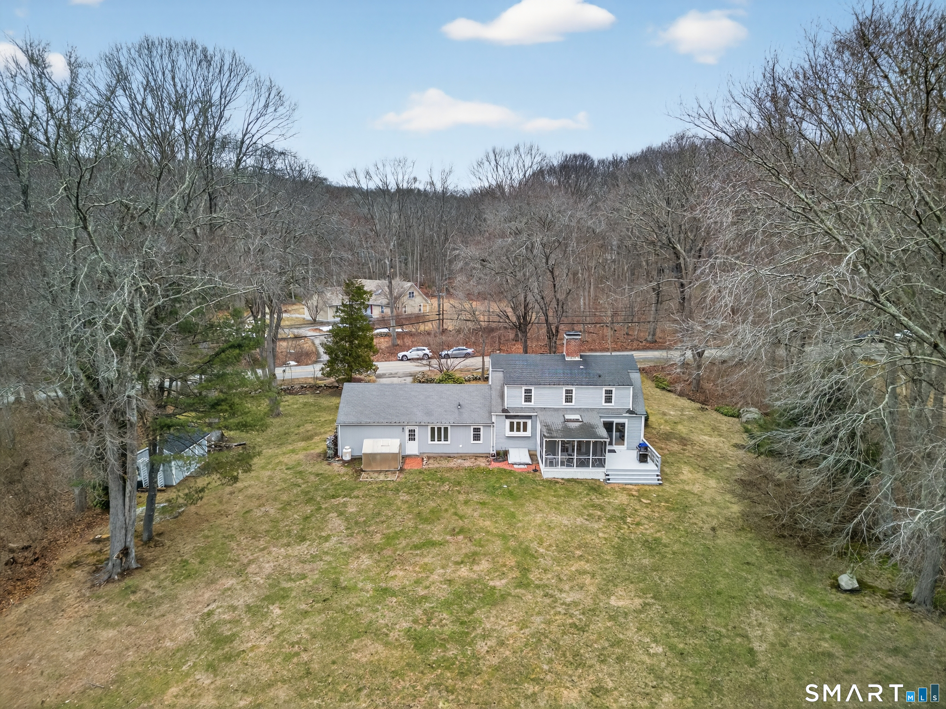 24 Saunders Hollow Road Old Lyme, CT 06371 - Photo 33 of 36 Shed, greenhouse, screened porch and grilling deck!