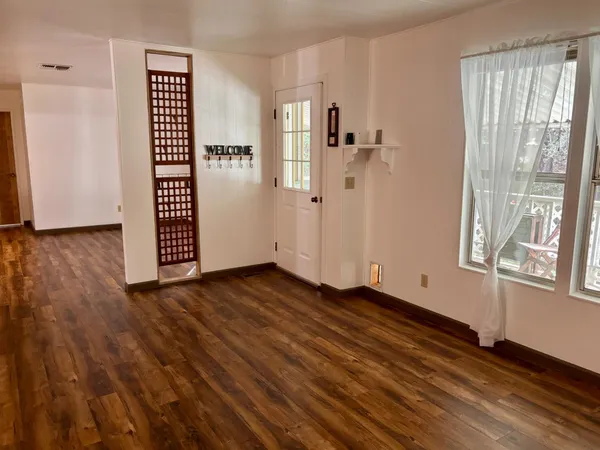 an empty room with window