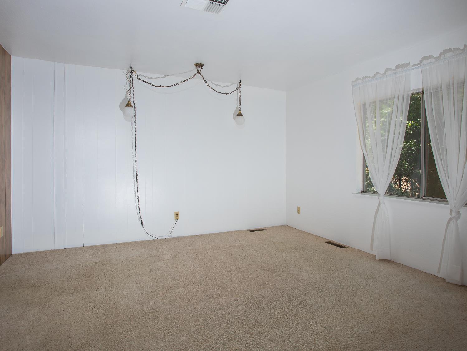 14074 Irish Town Road, Unit 40 Pine Grove, CA 95665 - Photo 19 of 51 a view of an empty room