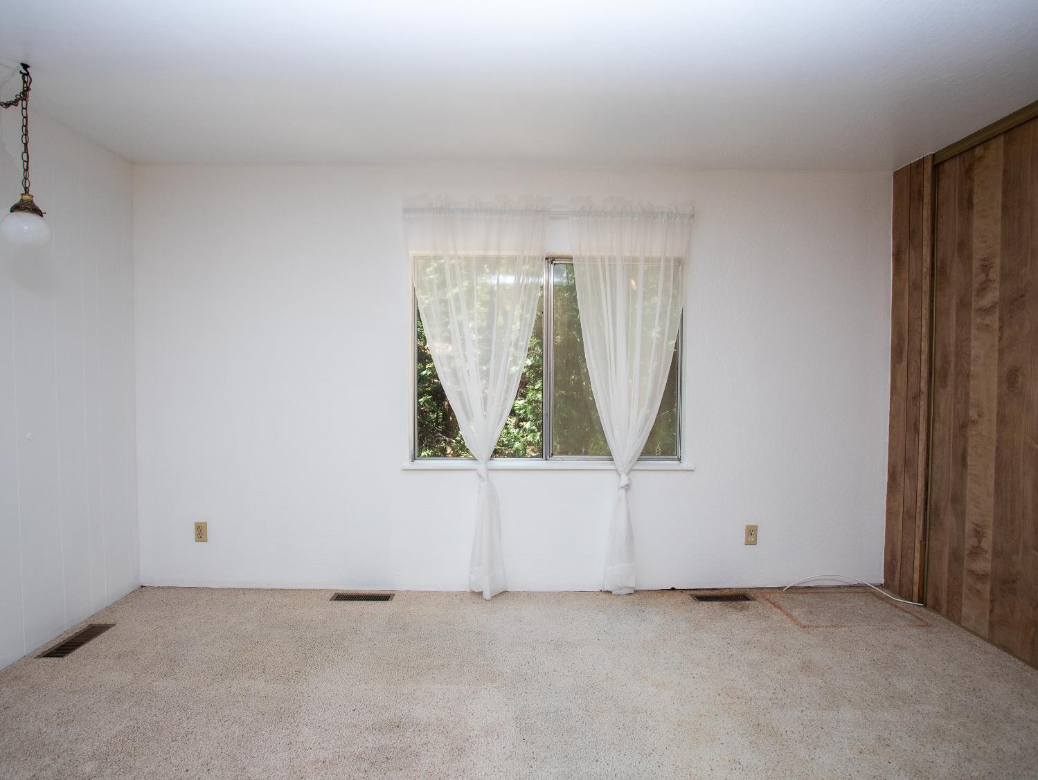 14074 Irish Town Road, Unit 40 Pine Grove, CA 95665 - Photo 21 of 51 an empty room with window