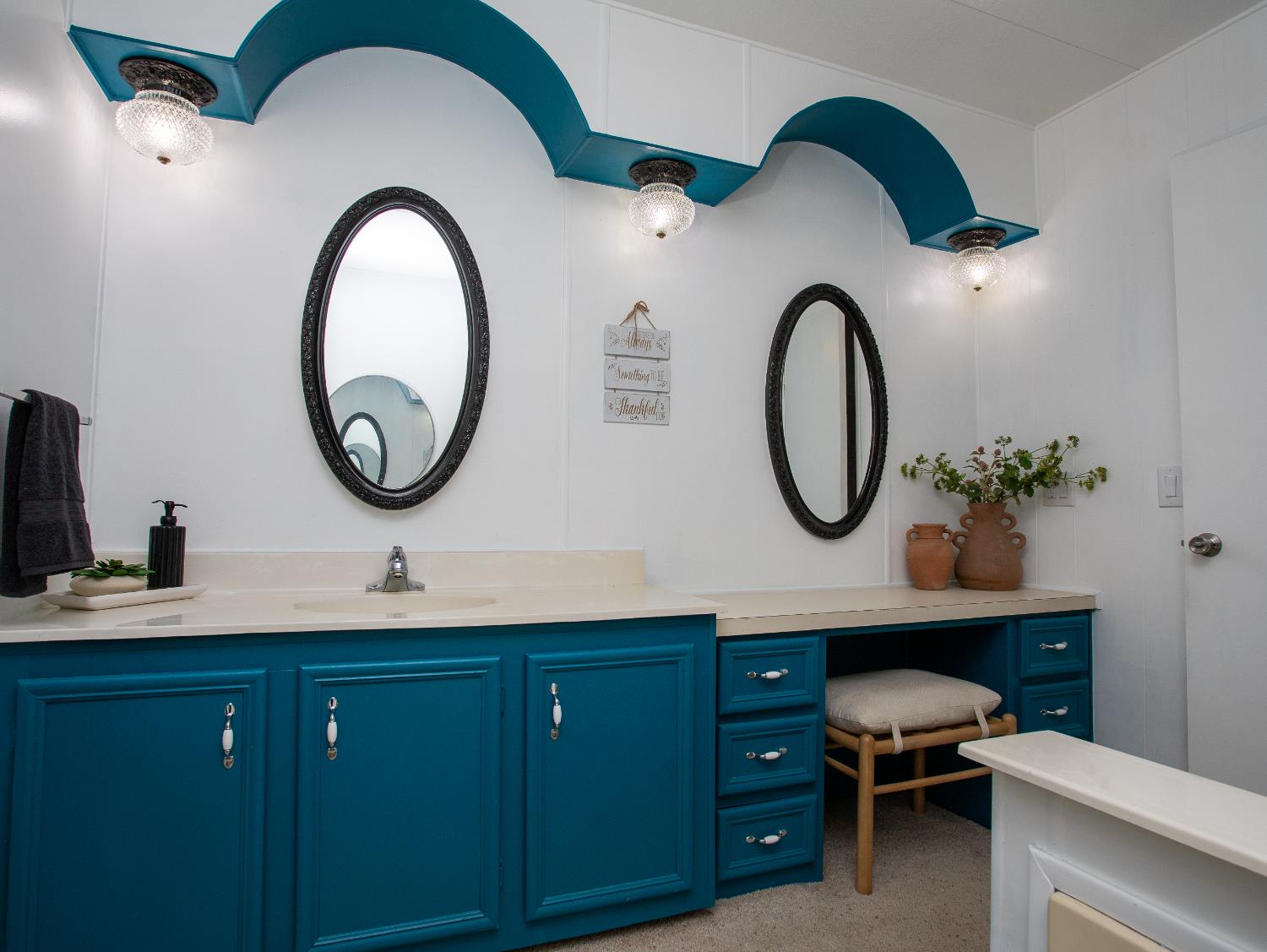 14074 Irish Town Road, Unit 40 Pine Grove, CA 95665 - Photo 22 of 51 a bathroom with a toilet a sink and a mirror