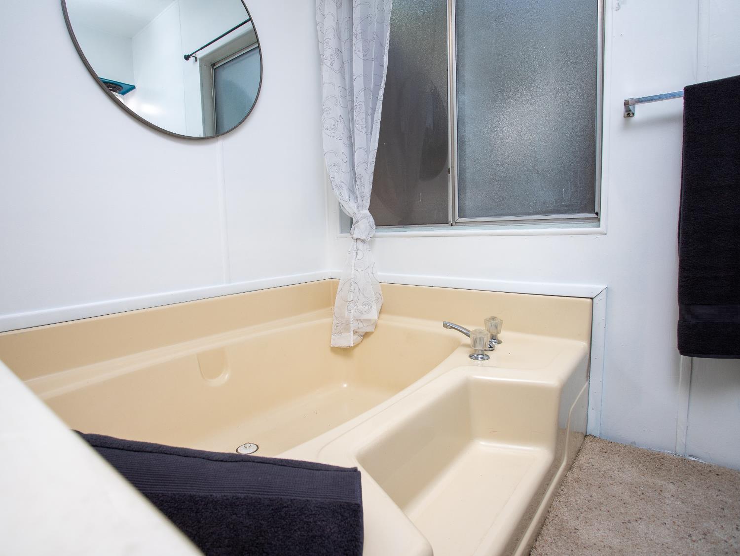 14074 Irish Town Road, Unit 40 Pine Grove, CA 95665 - Photo 25 of 51 a bathroom with a sink and a mirror