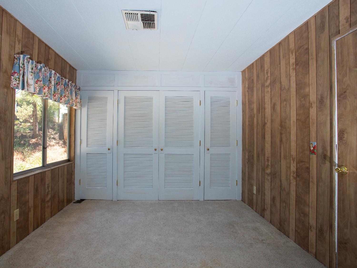 14074 Irish Town Road, Unit 40 Pine Grove, CA 95665 - Photo 26 of 51 a view of an empty room with windows and closet