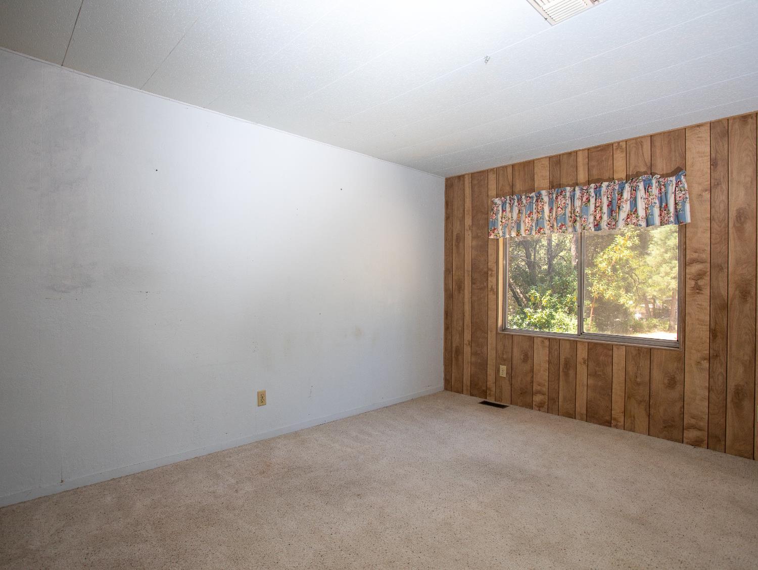 14074 Irish Town Road, Unit 40 Pine Grove, CA 95665 - Photo 27 of 51 an empty room with windows