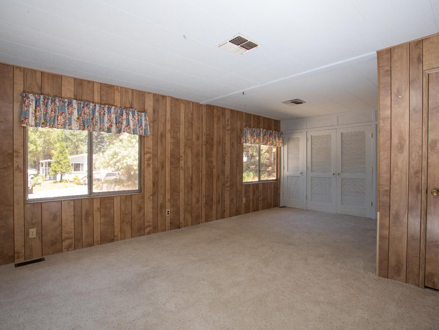 14074 Irish Town Road, Unit 40 Pine Grove, CA 95665 - Photo 28 of 51 a view of an empty room with large window
