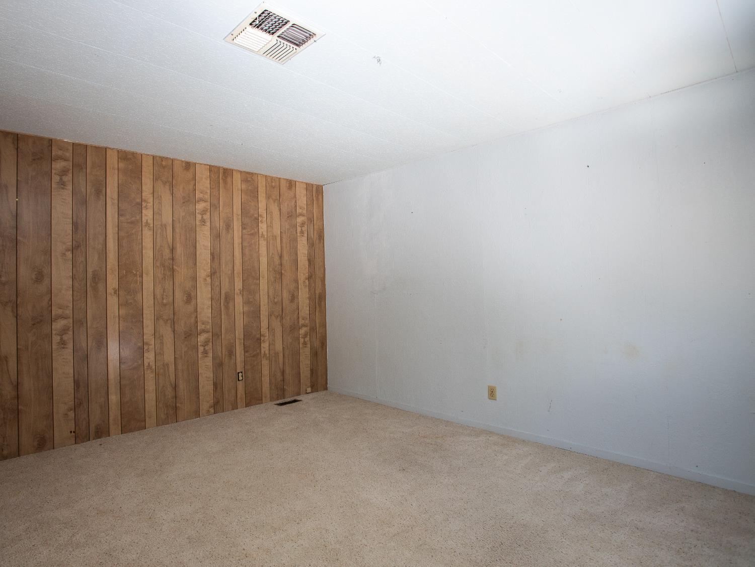 14074 Irish Town Road, Unit 40 Pine Grove, CA 95665 - Photo 30 of 51 a view of a room with a wooden floor and a window
