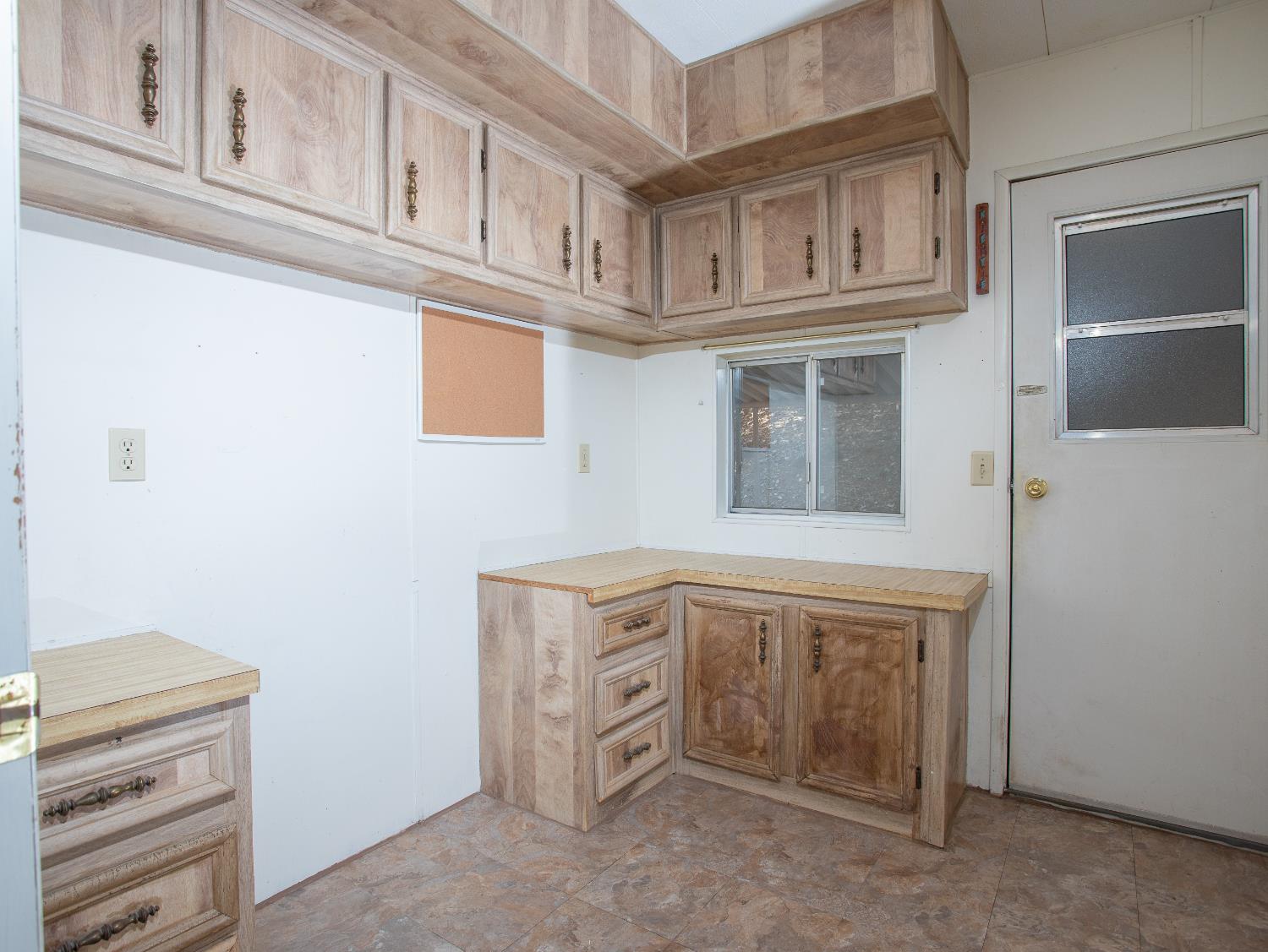 14074 Irish Town Road, Unit 40 Pine Grove, CA 95665 - Photo 33 of 51 a view of cabinets with entryway