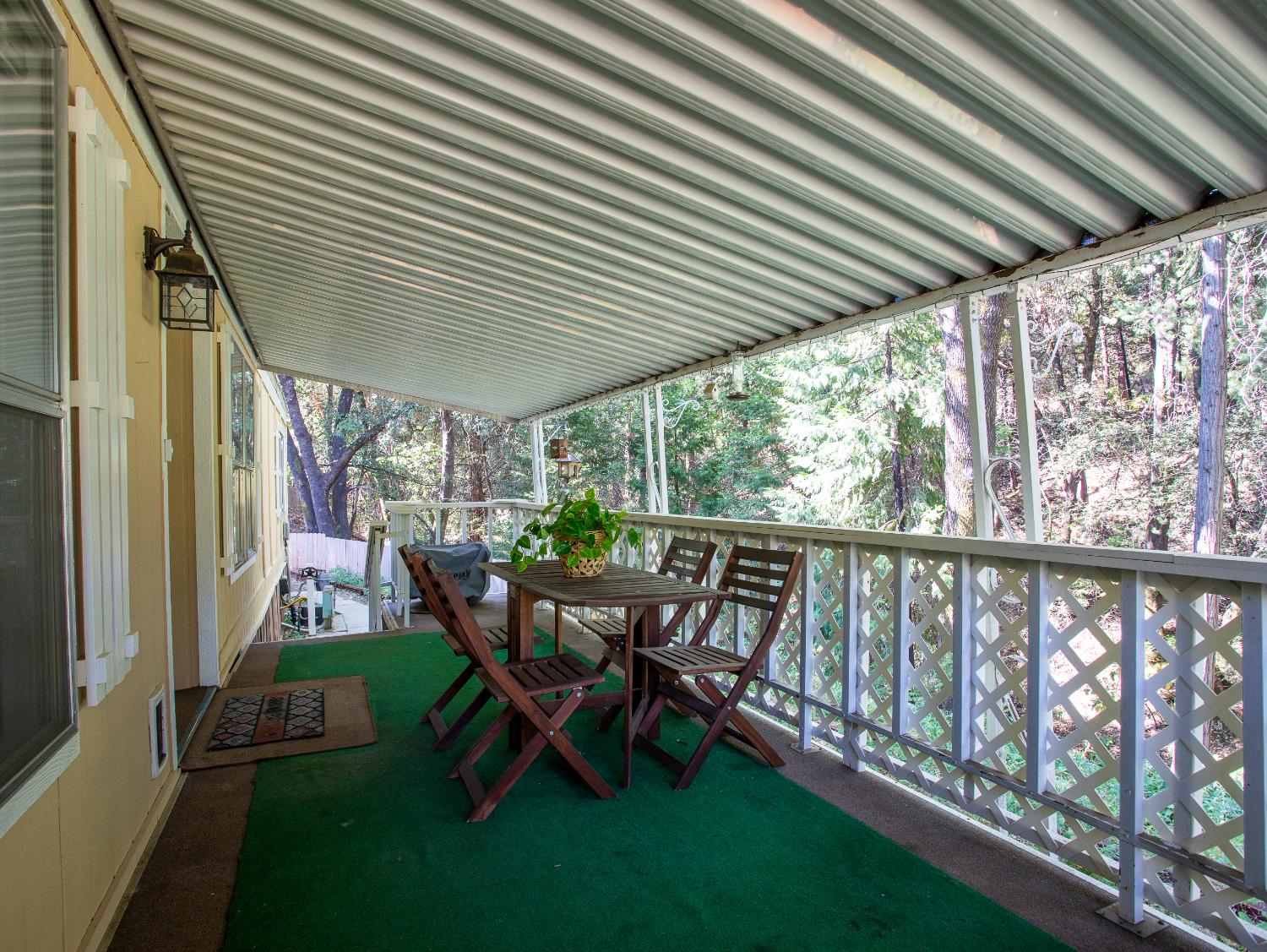 14074 Irish Town Road, Unit 40 Pine Grove, CA 95665 - Photo 7 of 51 a view of a chairs in backyard of house