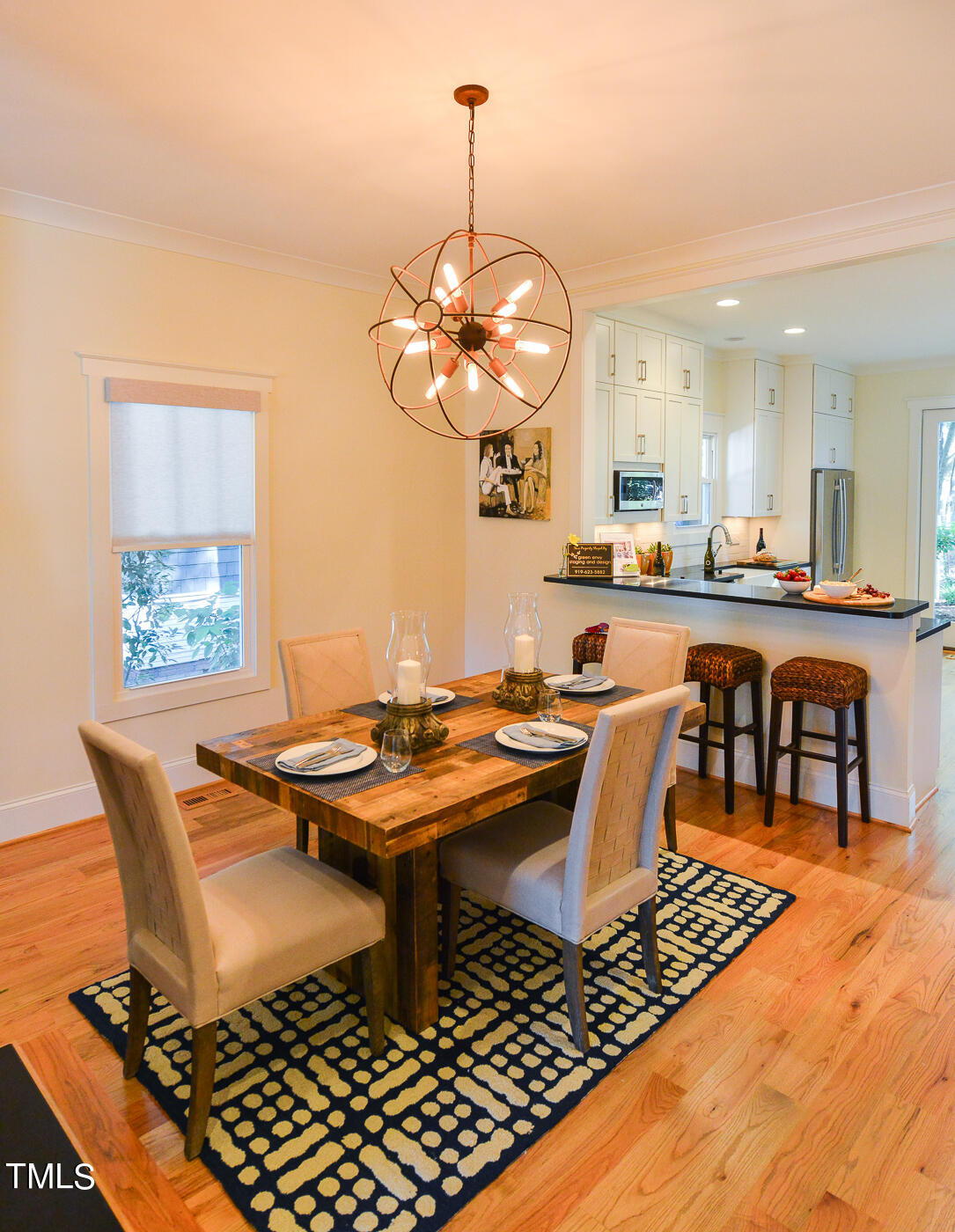 503 Cleveland Street Raleigh, NC 27605 - Photo 11 of 42 a dining room with a table and chairs