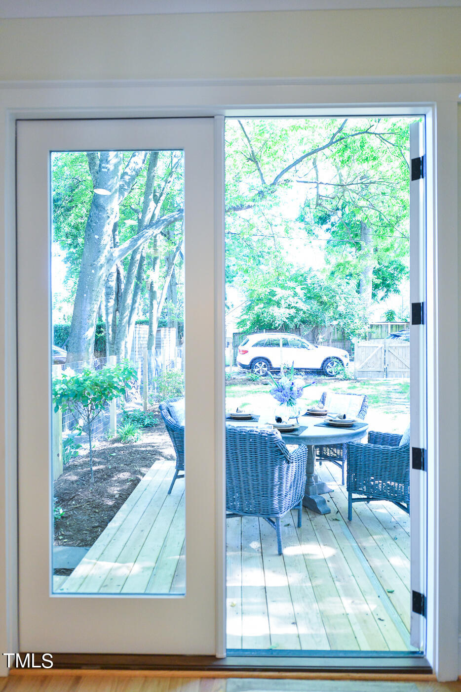 503 Cleveland Street Raleigh, NC 27605 - Photo 34 of 42 a living room view with a floor to ceiling window plants and outdoor view