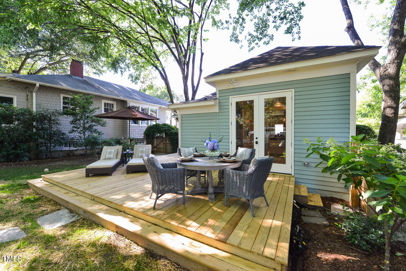503 Cleveland Street Raleigh, NC 27605 - Photo 36 of 42 a view of a house with backyard and sitting area