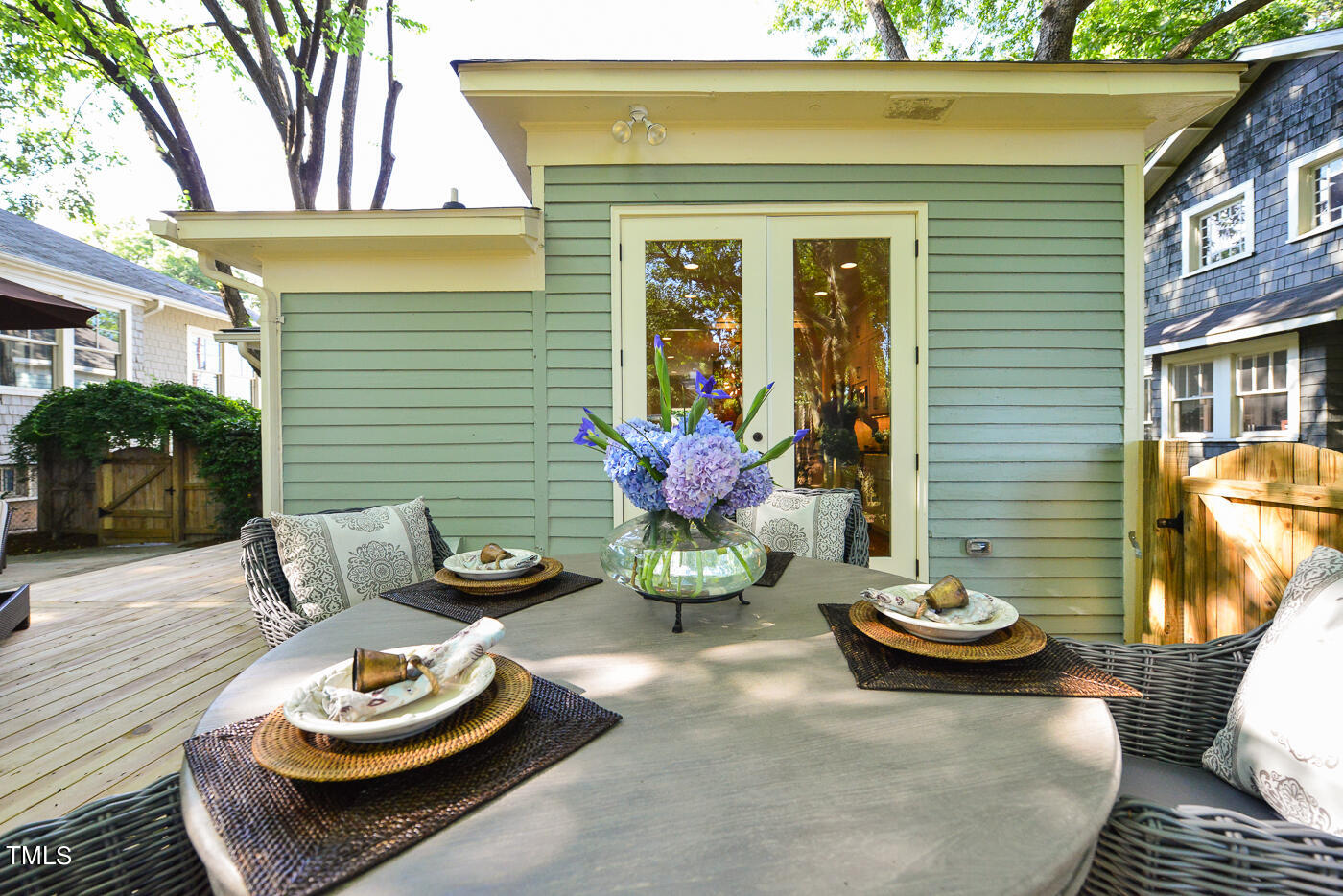 503 Cleveland Street Raleigh, NC 27605 - Photo 38 of 42 a view of a two chairs and a table in the patio