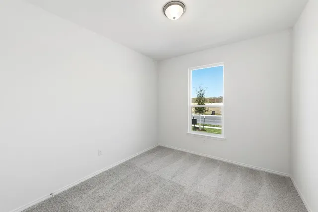 a view of a window in an empty room