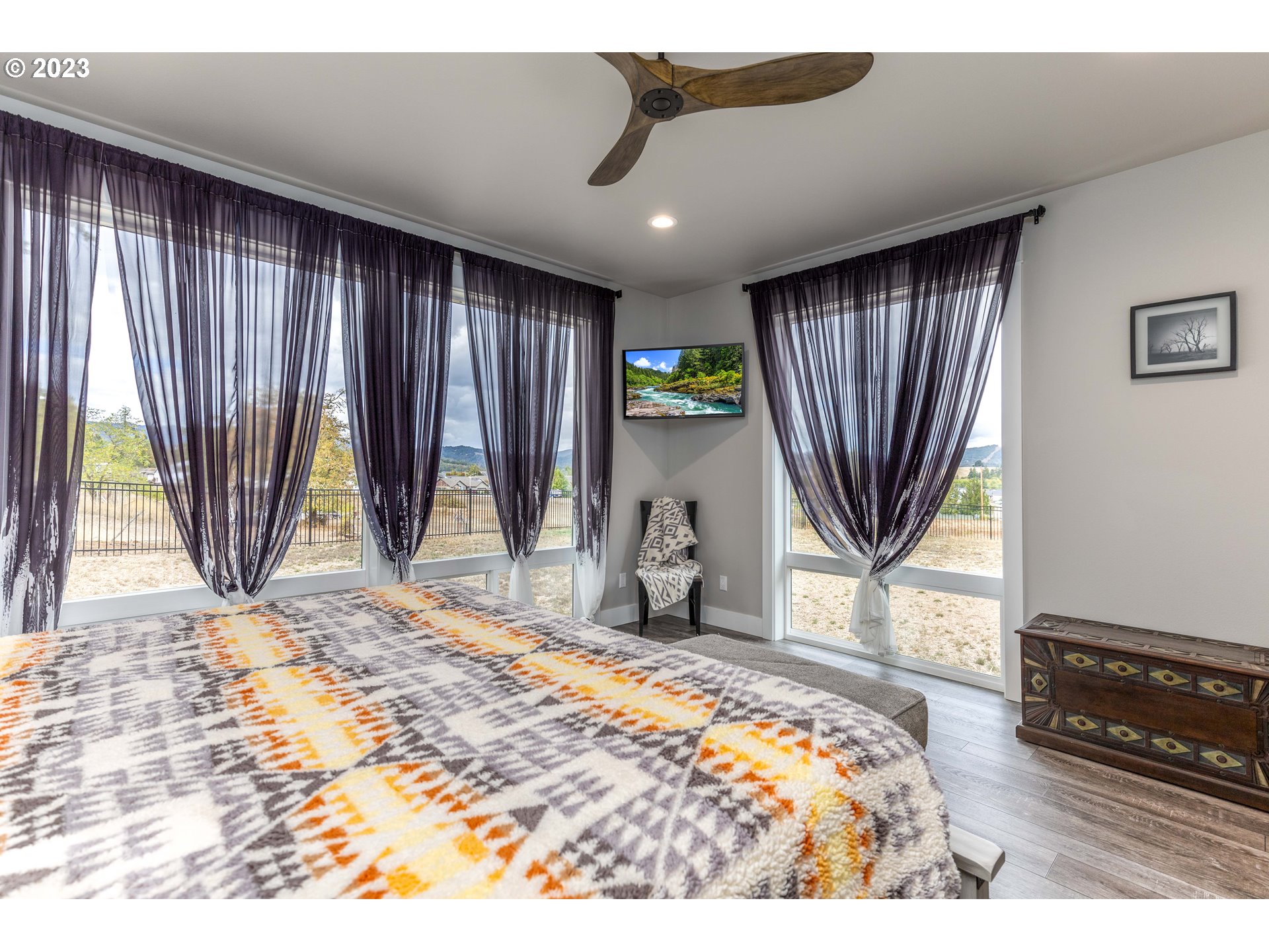 674 Fort McKay Road Sutherlin, OR 97479 - Photo 29 of 45 a bedroom with bed and a window