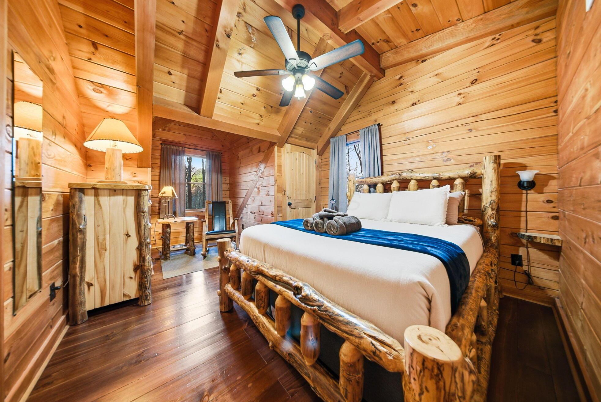 15399 Clapper Hollow Road Laurelville, OH 43135 - Photo 29 of 61 Upper Level Bedroom with Sitting Area with a Queen Bed and Custom Log Furniture