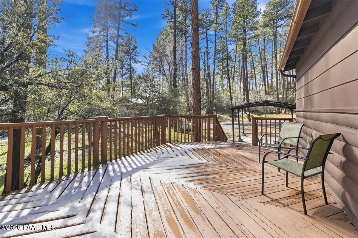 1383 West Boulder Road Prescott, AZ 86303 - Photo 16 of 21 a view of balcony with wooden floor and outdoor seating