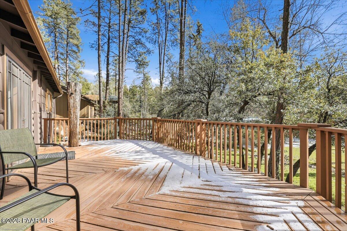 1383 West Boulder Road Prescott, AZ 86303 - Photo 17 of 21 a view of a balcony with wooden floor and fence