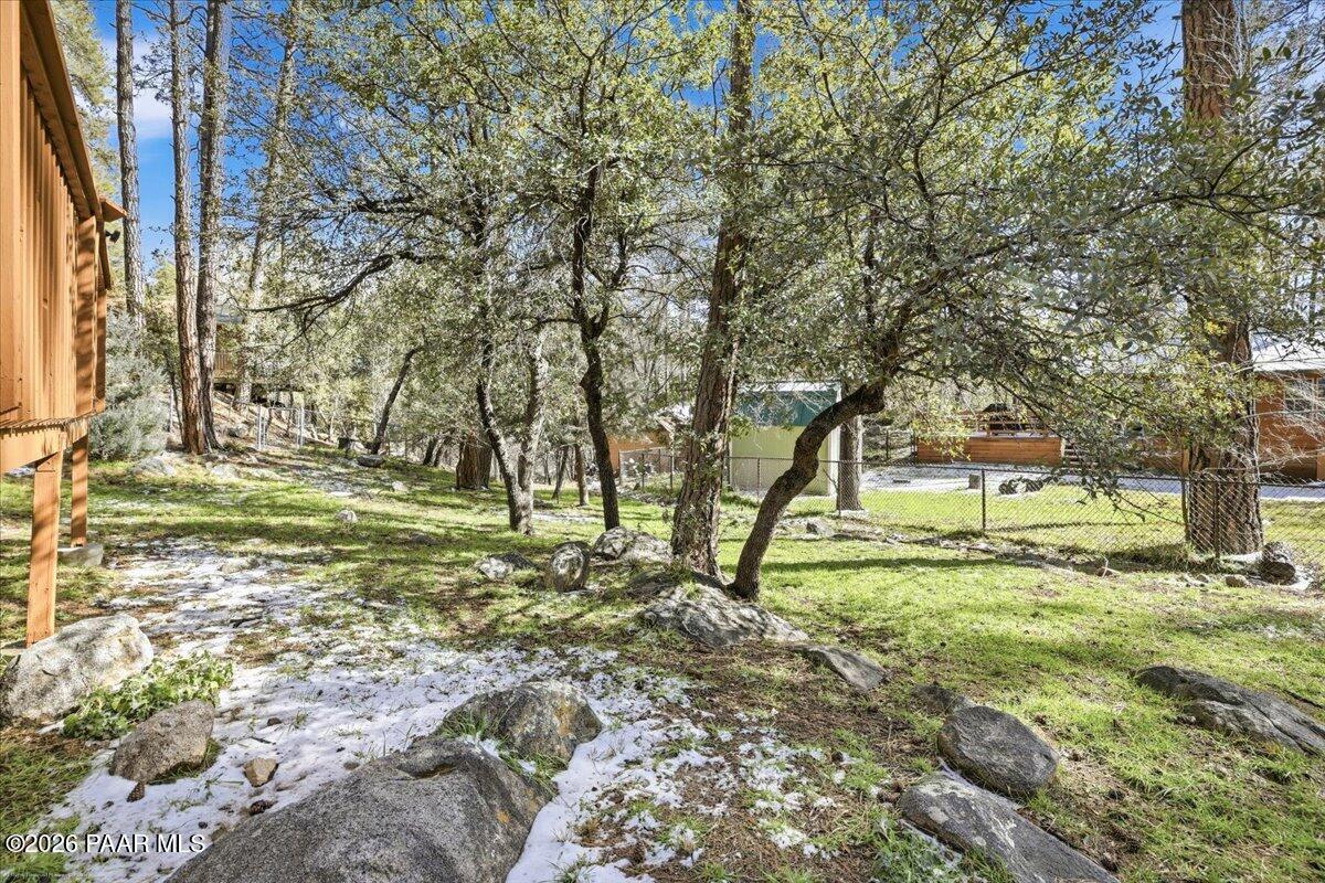 1383 West Boulder Road Prescott, AZ 86303 - Photo 19 of 21 a view of a yard with a tree