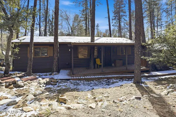 a view of a backyard of the house