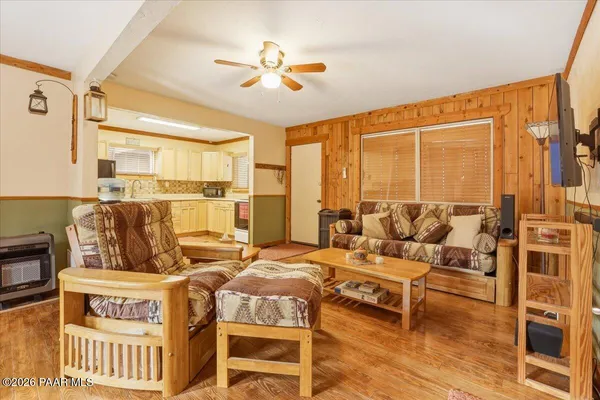 a living room with furniture and a window
